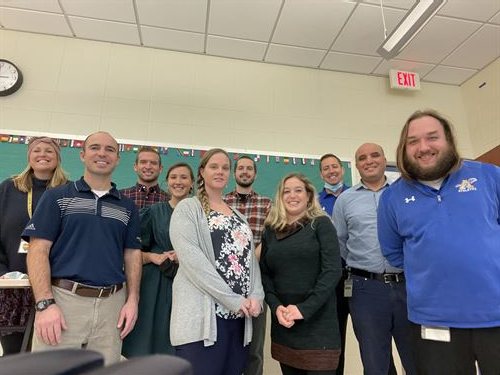 The math department teachers in a group